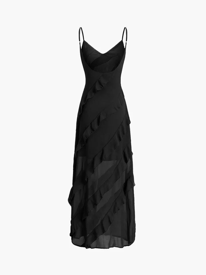 Asymmetrical strap ruffle maxi dress in soft, flowy fabric with a unique silhouette and stylish design.