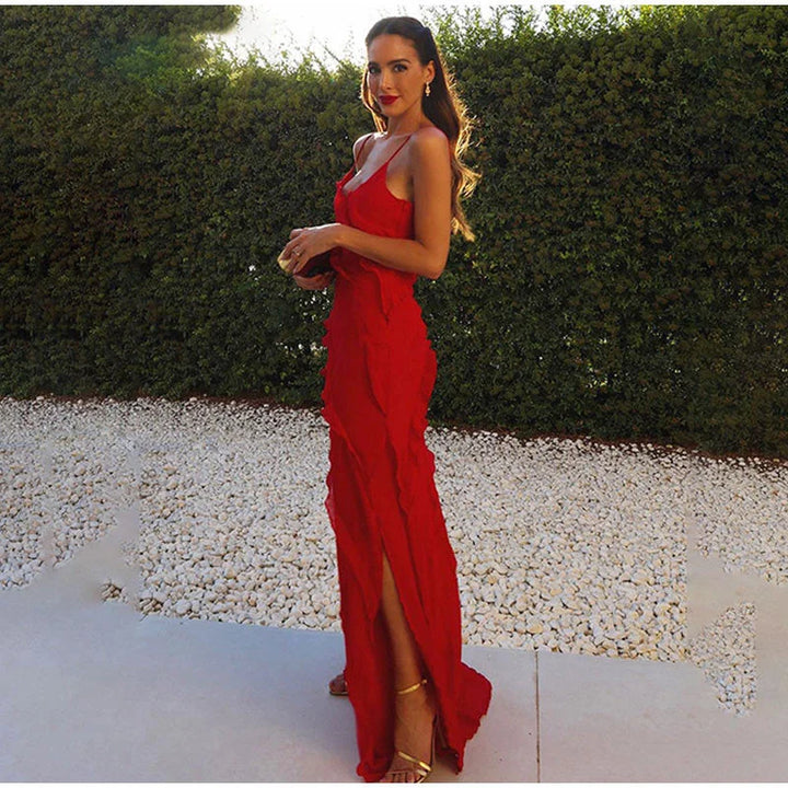 Black asymmetrical strap ruffle maxi dress with flowy design, perfect for a casual yet chic look.