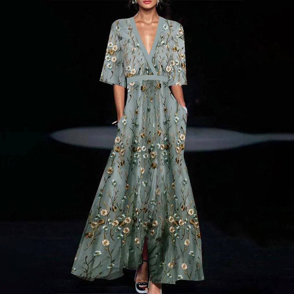 Green floral dress with plunging neckline, featuring a vibrant floral pattern and a stylish design. Perfect for a casual yet…