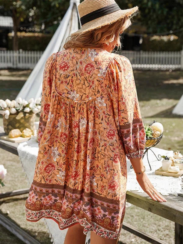 Boho-inspired mini dress with delicate prints, featuring flowy silhouette, perfect for a casual, breezy look.