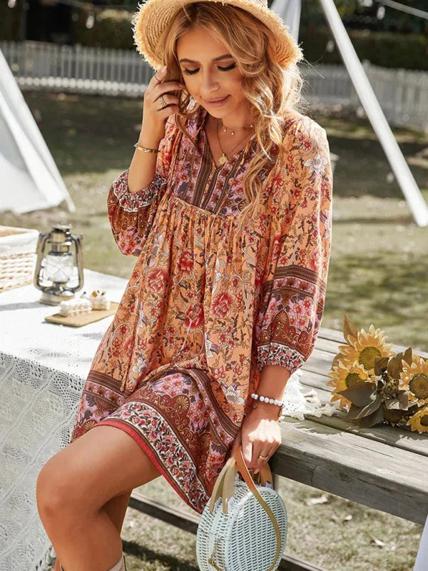 Boho-inspired mini dress featuring delicate prints, perfect for a casual chic look.