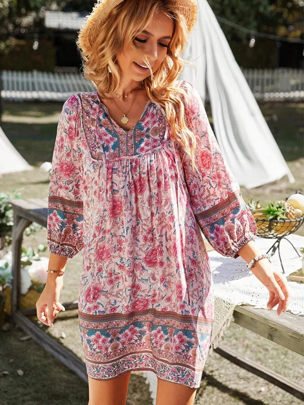 Boho-inspired mini dress with delicate prints and flowing silhouette, perfect for a laid-back chic look.