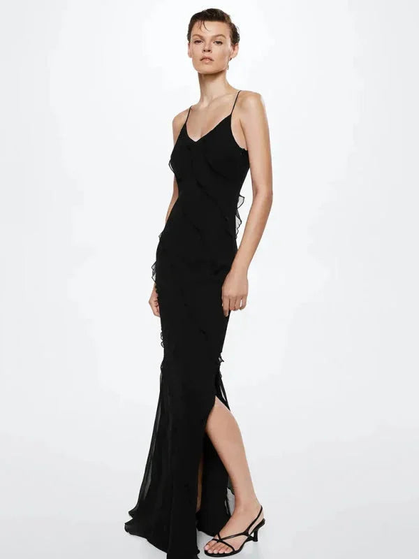 Spaghetti strap tiered ruffle maxi dress in a flowy and lightweight fabric with a tiered design and feminine silhouette.
