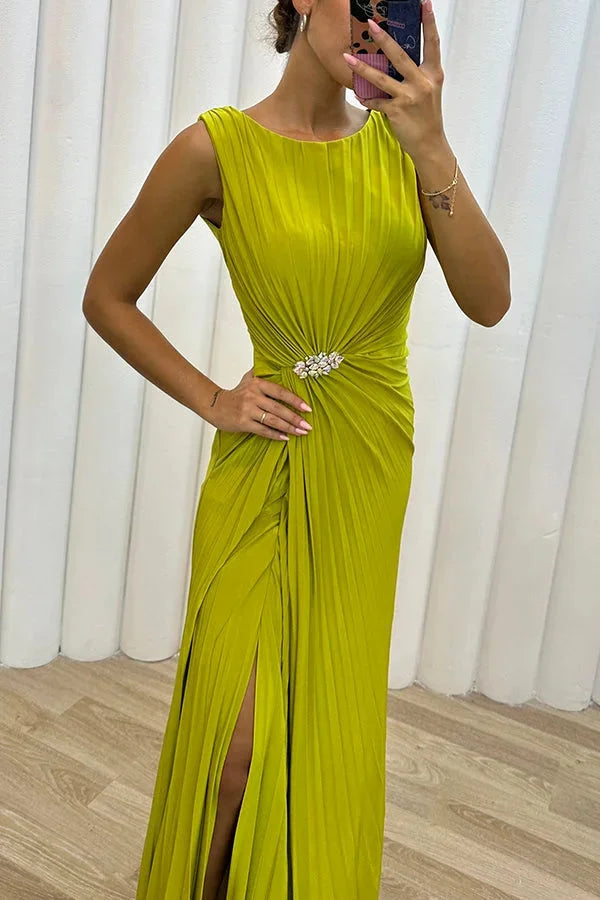 Navy pleated maxi dress with jewel detail, ideal for special occasions or formal events.