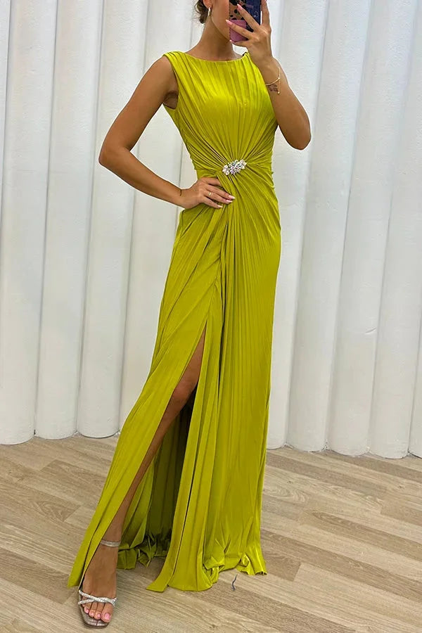 Pleated maxi dress with jewel detail in a soft, flowing fabric, ideal for special occasions or formal events.