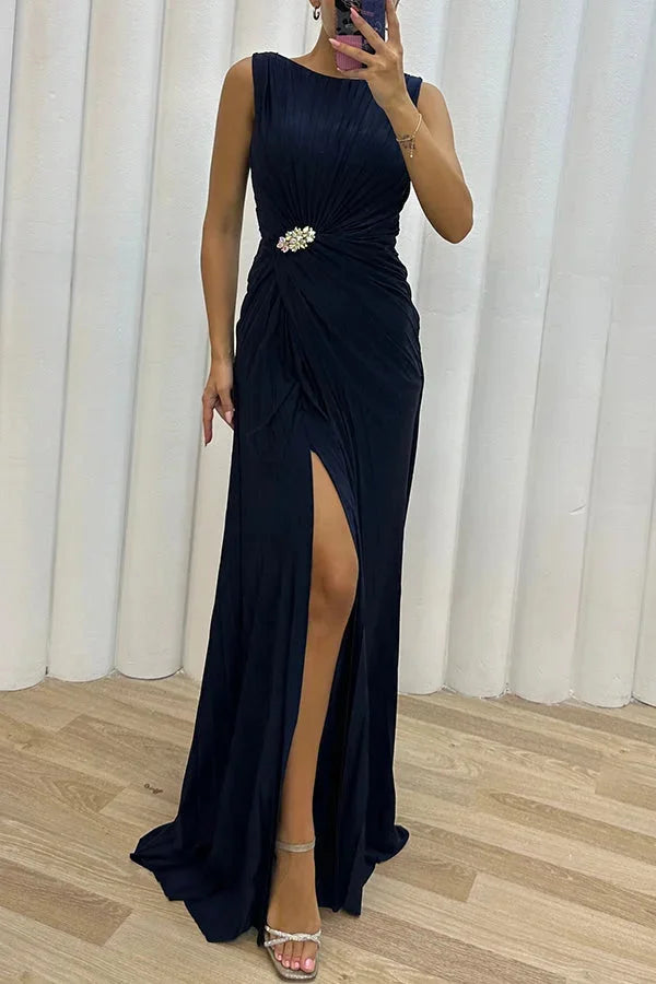 Pleated maxi dress in golden beige with jeweled neckline, sophisticated and elegant design by Mehlani.