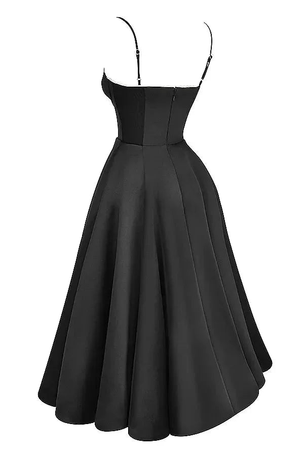 Satin black dress with soft cream tulle overlay, elegant and sophisticated evening gown perfect for special occasions.