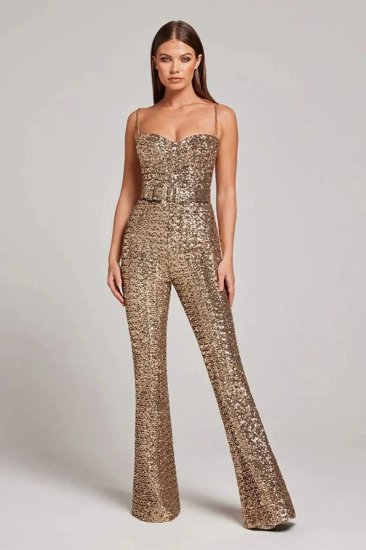 Shimmering silver jumpsuit with strapless design and waist belt, perfect for a glamorous night out.