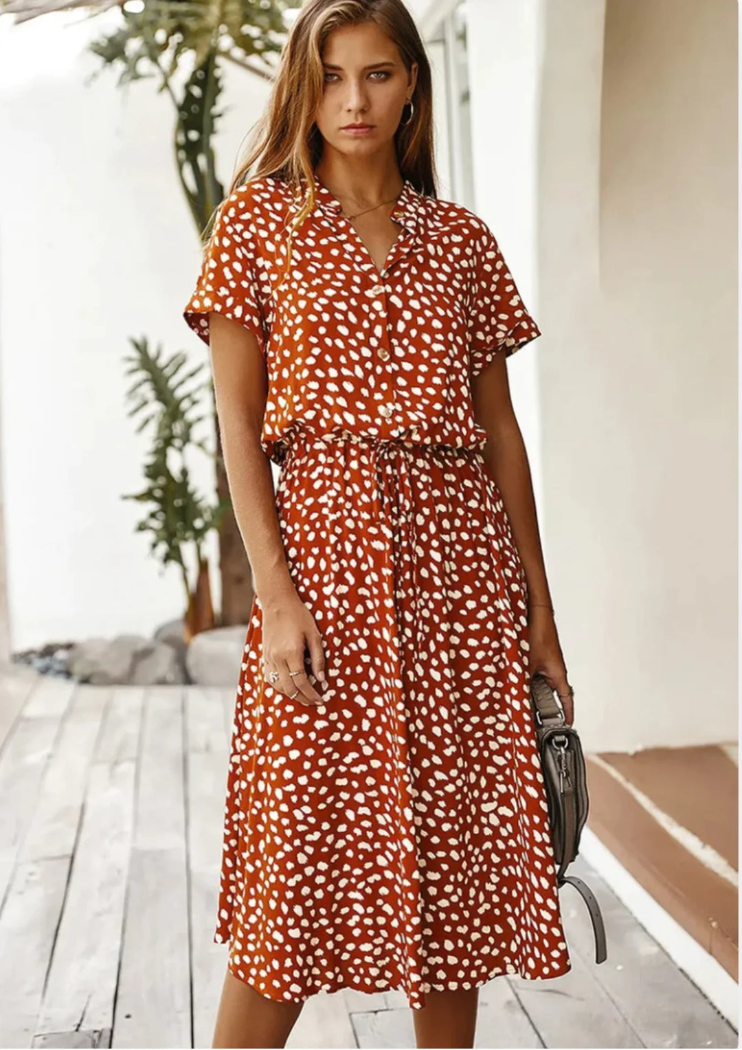 Orange red polka dot midi dress with waist tie, made of lightweight and flowy fabric. Perfect for casual outings or a day at…