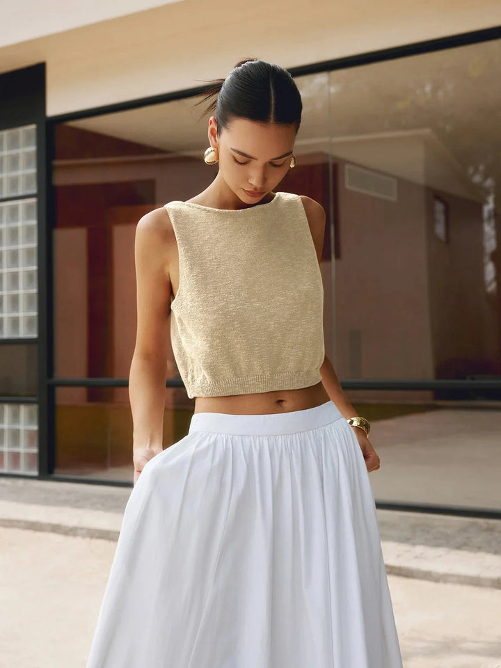 Apricot textured sleeveless crop top with unique design and comfortable material by Mikah.