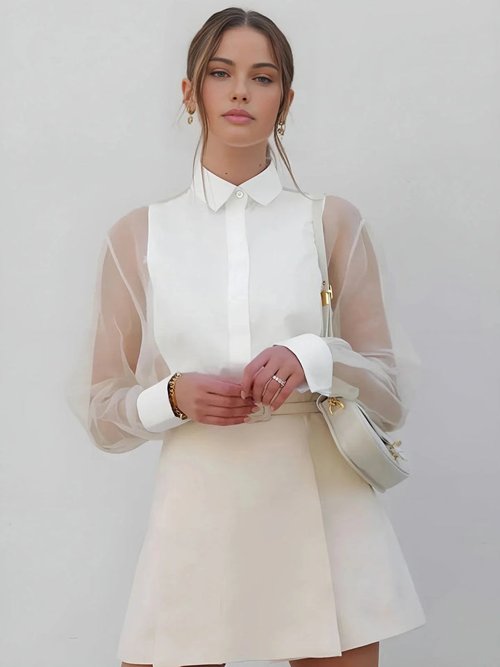 White collared dress with sheer sleeves, trendy and chic design perfect for any occasion.