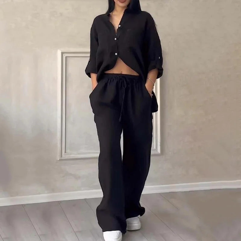 "Black linen shirt and pant duo set with an effortless fit, perfect for a relaxed and stylish look."