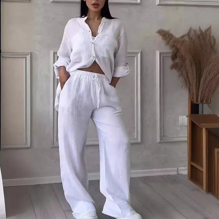 White linen shirt pant set with an effortless fit, crafted from airy fabric.