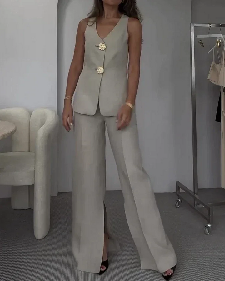 Sleeveless top and wide-leg pants set in a soft linen blend with decorative buttons.