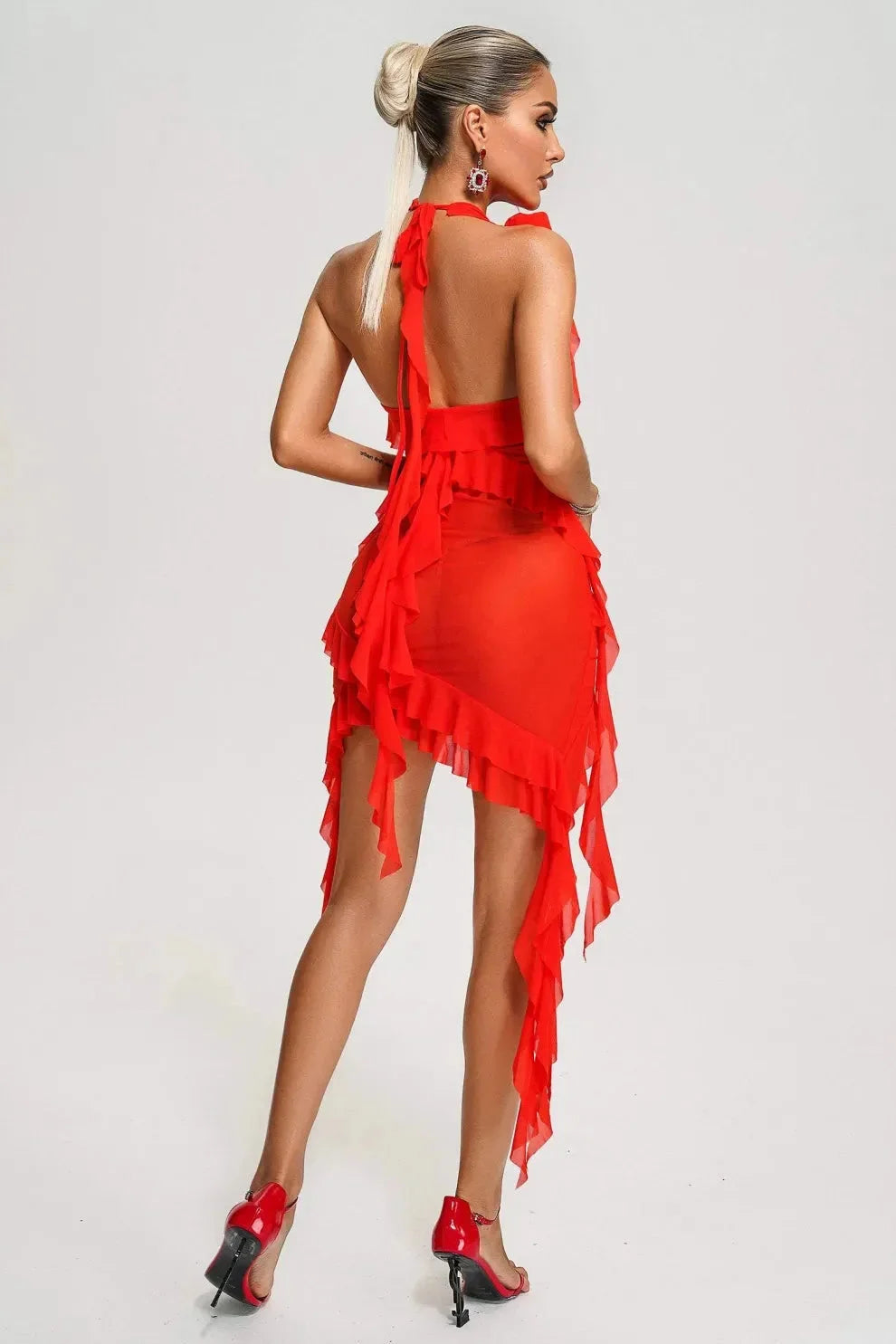 Women's ruffled mini dress with rose applique, perfect for a chic look. Crafted from soft floral fabric, ideal for any…