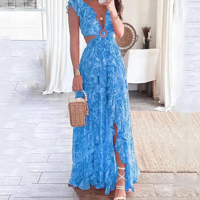 Blue floral V-neck maxi dress by Nailea, featuring a flowy design with floral patterning, made of soft, comfortable material.