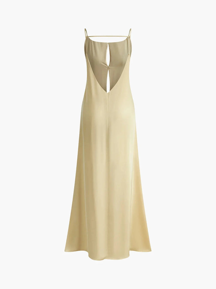 "Naisha - Women's backless maxi dress in soft cotton with sleek spaghetti straps, perfect for a breezy summer day"
