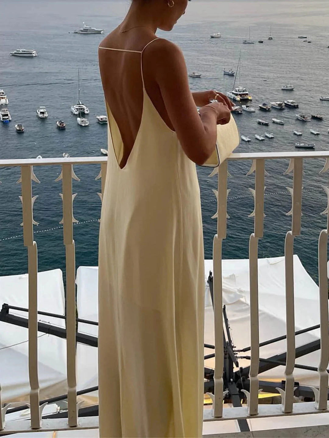 Apricot backless maxi dress for women with sleek straps, designed for a trendy and elegant look.