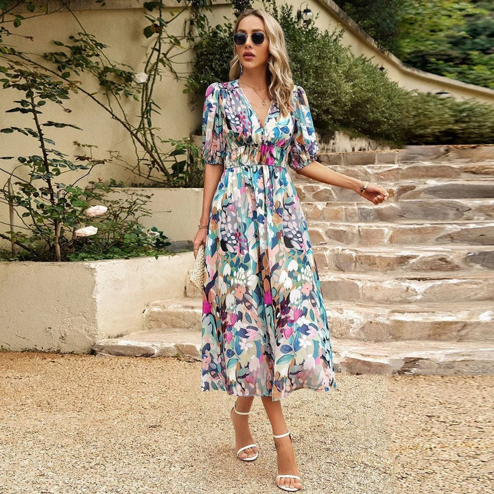 Multicolour floral midi dress with elastic waist for effortless style and comfort.