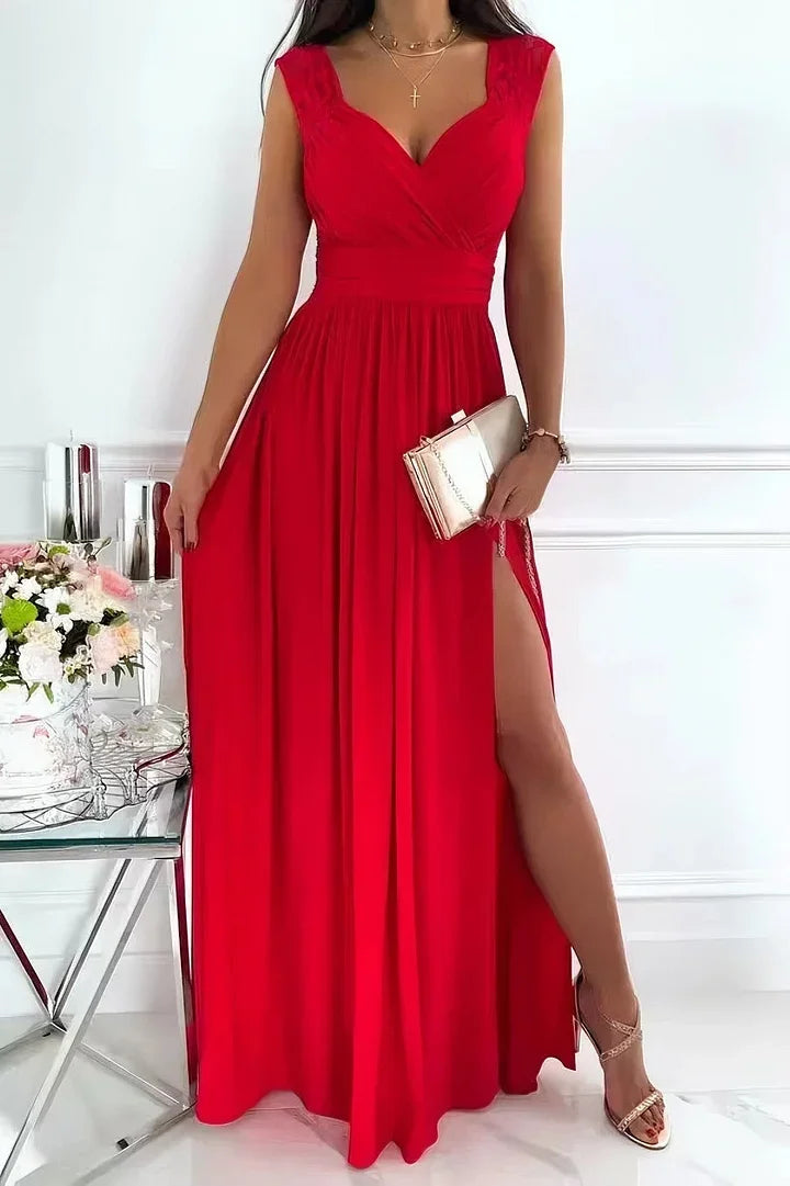 Red lace sleeveless maxi dress with slit. Elegant and timeless design perfect for special occasions or a night out.