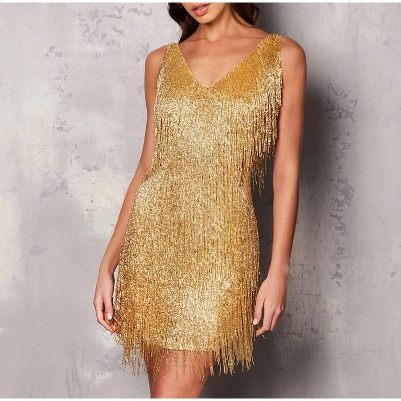 Gold feathered mini dress with adjustable straps, perfect for a glamorous evening.