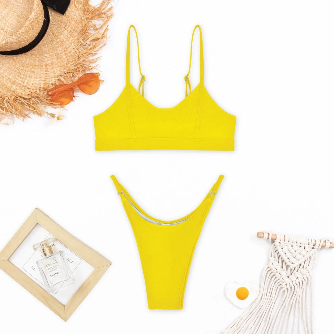 Yellow push-up bikini with adjustable straps and sleek design for optimal fit. Made with high-quality, stretchy fabric for…