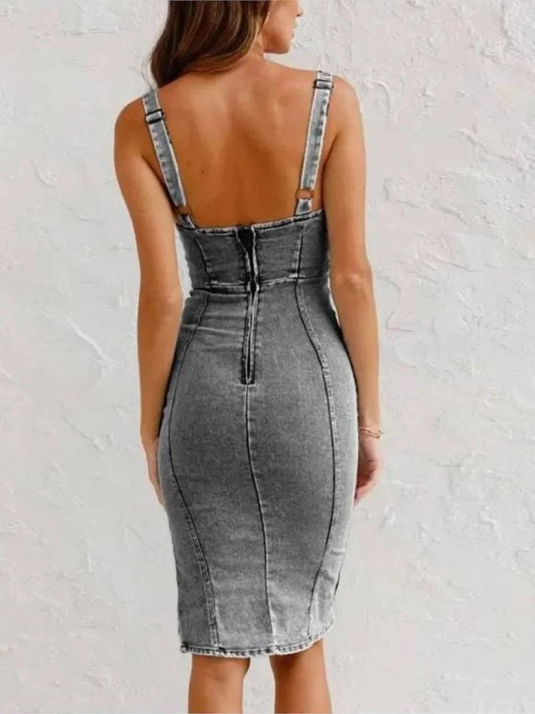 "Neha denim midi dress in a sleek fit. Featuring a flattering silhouette with classic denim detailing."