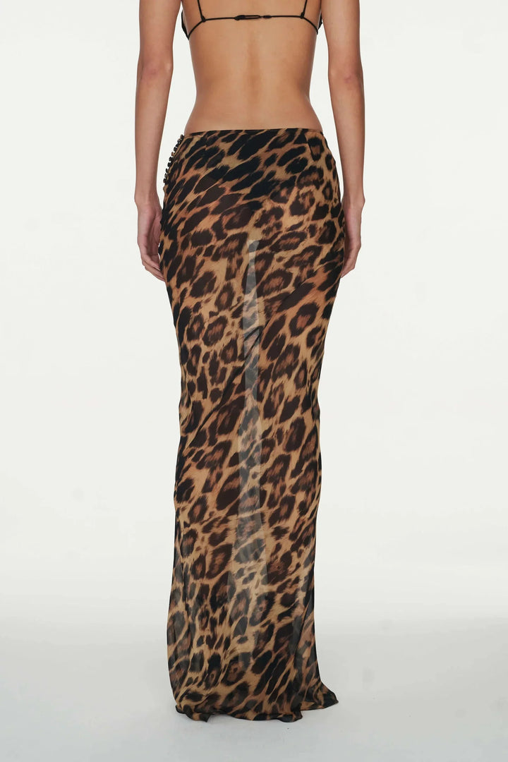 "Nella women's floor-length skirt in animal print, made of lightweight and flowy fabric, perfect for adding a wild touch to…
