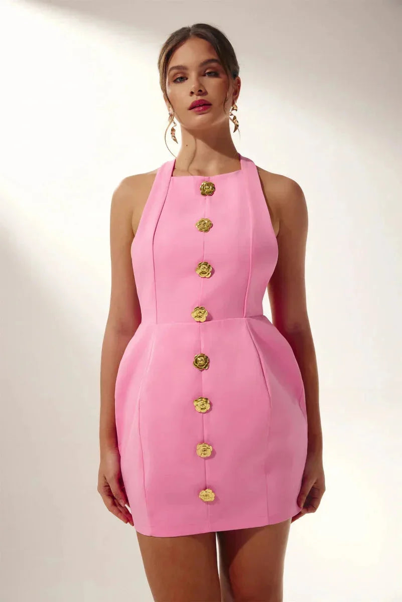 Halter mini dress with delicate floral embellishments, ideal for summer outings, made from lightweight fabric in a charming…