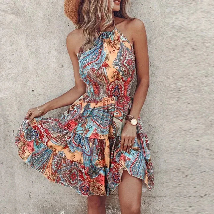 Light blue halter neck mini dress with intricate crochet detailing, perfect for a bohemian summer look.