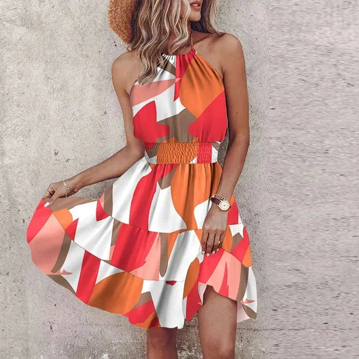 Red halter neck mini dress with a vibrant design and a body-hugging fit, perfect for a night out.