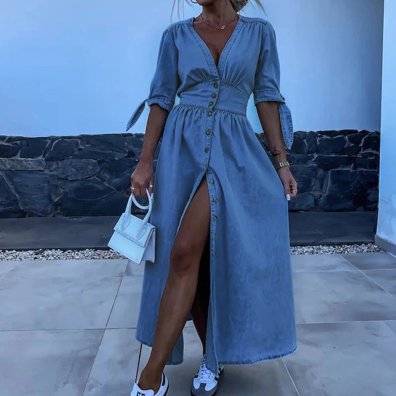 "Denim dress with button-front detail and tie sleeves from Noa, perfect for casual chic looks."