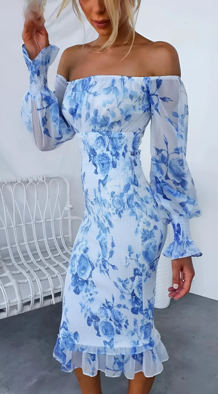 Off-shoulder midi dress with floral pattern and ruffles in soft, cotton blend fabric perfect for a casual or dressy look.