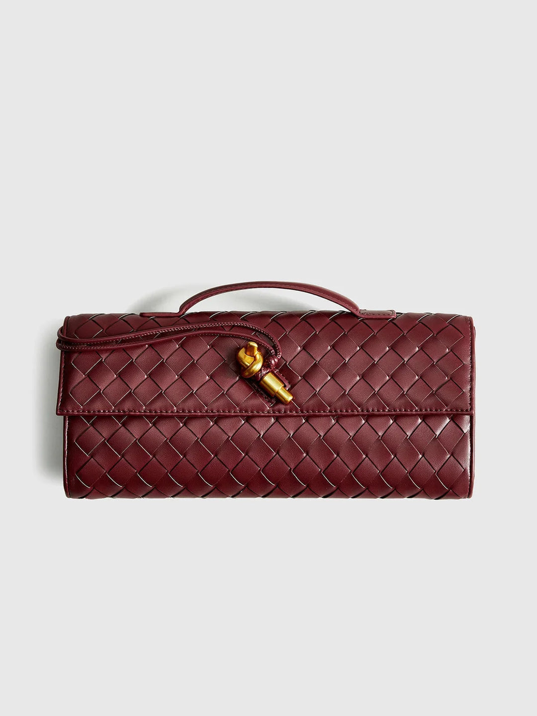 Opal shoulder bag in quilted design with secure clasp, made of durable material.