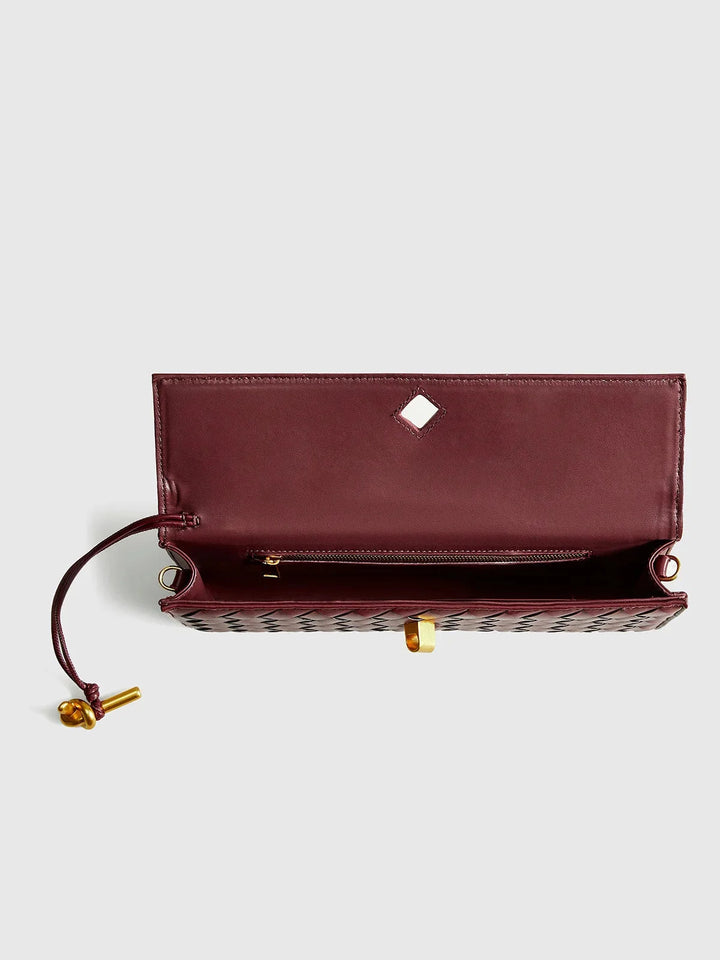"Opal shoulder bag with quilted design, secure clasp, and a versatile strap for effortless styling."