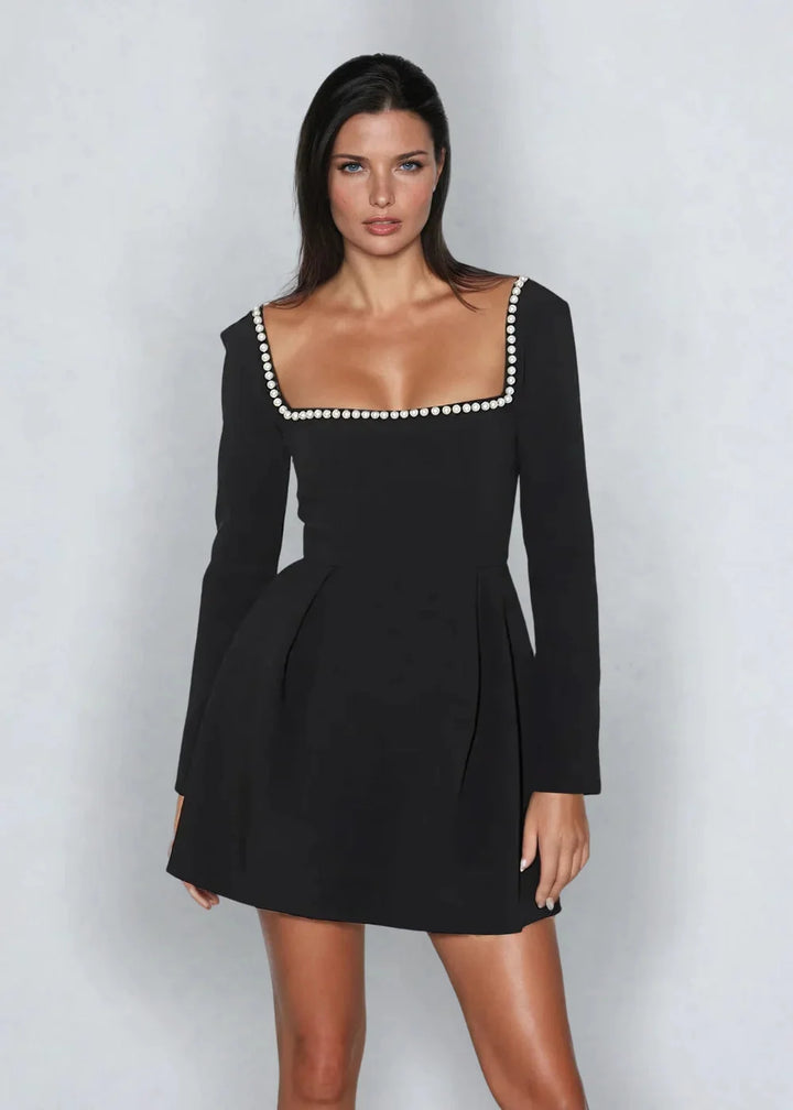 Square neck mini dress in black with intricate bead detail, perfect for a chic and stylish look.