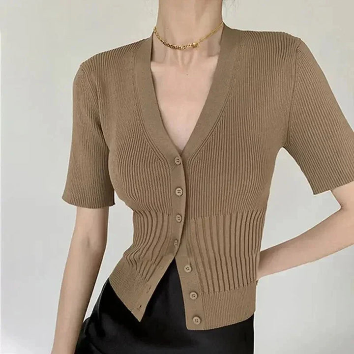Rhoda knit cardigan in Kafe, a fitted silhouette with button details. Crafted from soft and comfortable knit material.