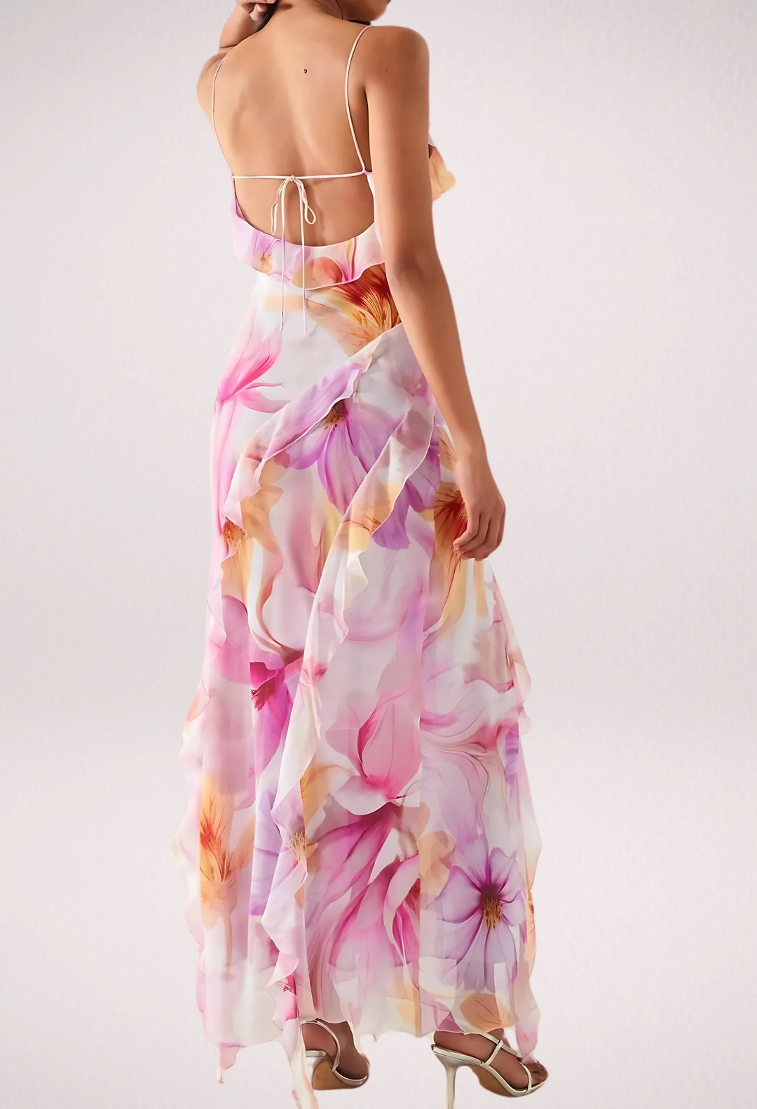 "Sleeveless floral maxi dress by Rihanna with ruffle trim, perfect for a casual chic look."