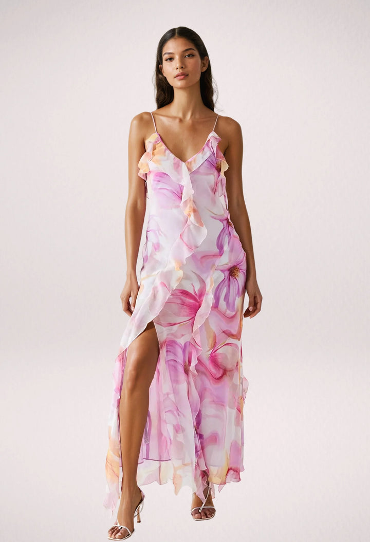 "Sleeveless floral maxi dress by Rihanna with ruffle trim, perfect for a summer day out. Made of lightweight and flowy…