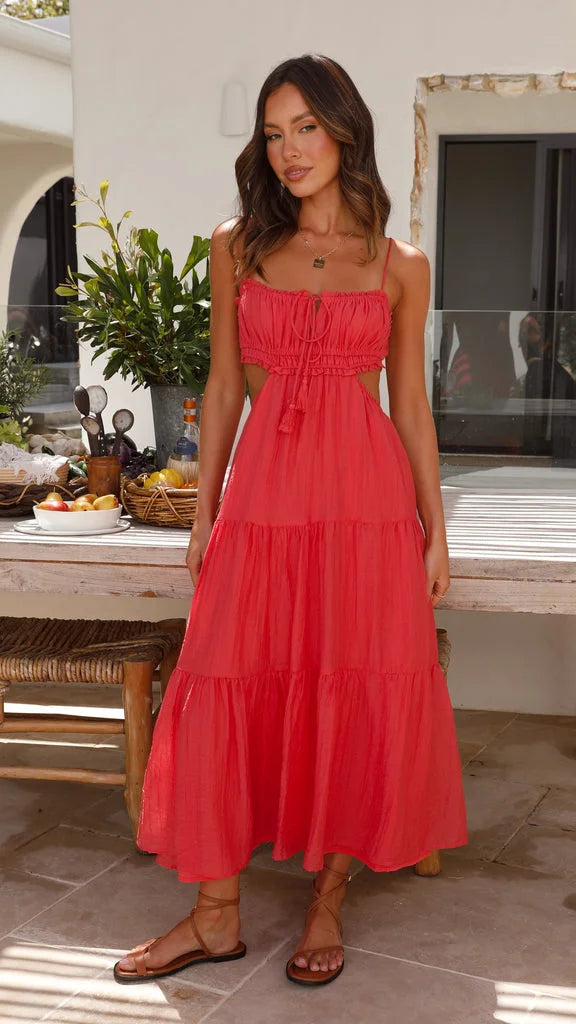 Women's tiered drawstring maxi dress in soft cotton blend fabric with floral print and adjustable waist tie.