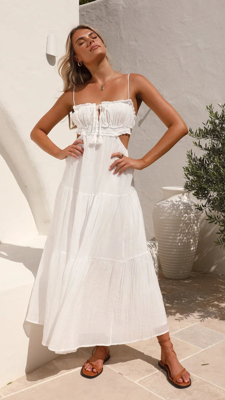 "Women's tiered drawstring maxi dress in soft cotton blend with bohemian floral print in pink and white, perfect for casual…