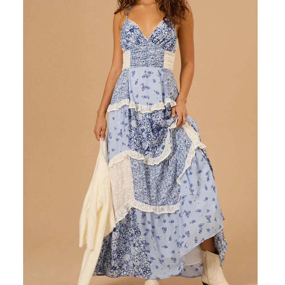 "Women's tiered floral maxi dress in soft chiffon fabric, featuring a flowing silhouette and vibrant floral pattern."