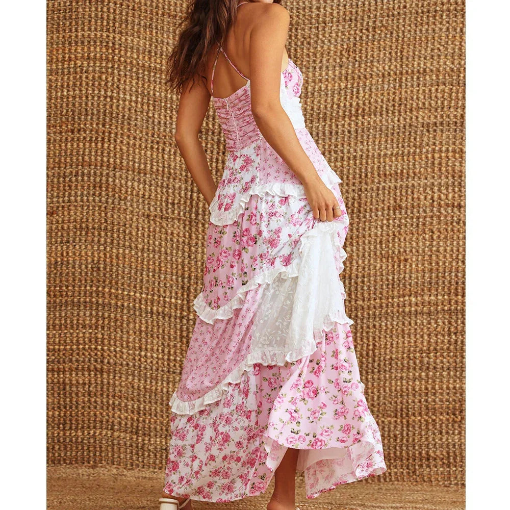 "Women's tiered floral maxi dress with a flowy design, perfect for summer weather, featuring vibrant floral patterns on…