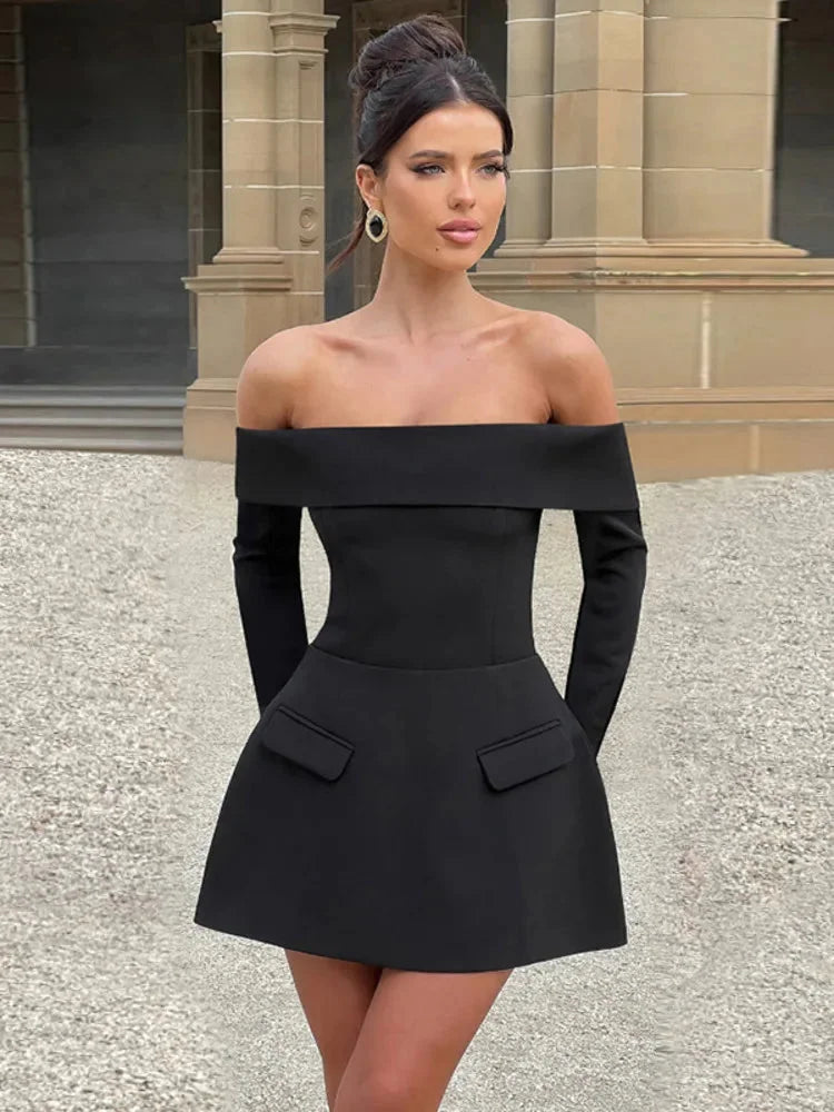 "Black off-shoulder skater dress with long sleeves, made of soft stretch fabric, perfect for a stylish and comfortable look."