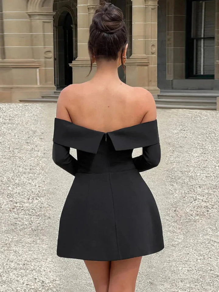 Off-shoulder skater dress in soft jersey fabric with a flattering fit and long sleeves for a stylish and comfortable look.