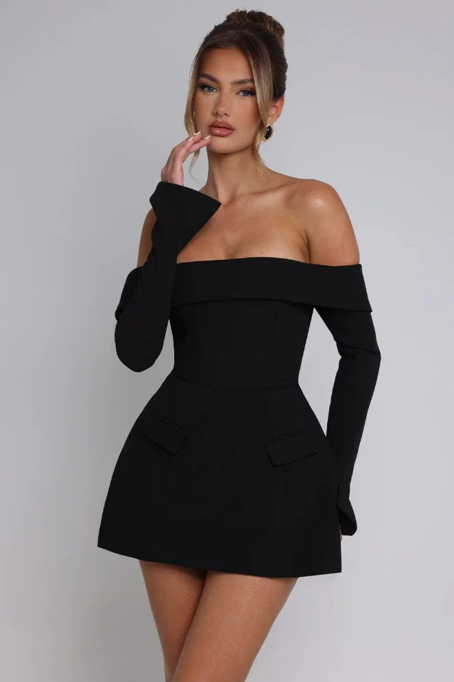 Off-shoulder skater dress in deep navy blue, featuring elegant long sleeves and a flattering silhouette.