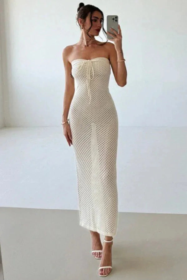 "Apricot crochet maxi dress with strapless design, featuring intricate cream detailing. Perfect for a casual yet stylish…