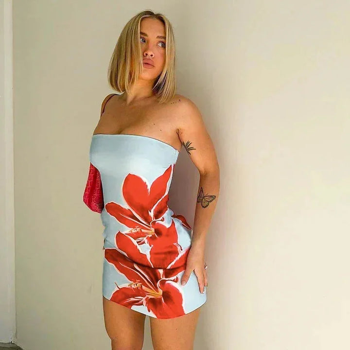 Strapless mini dress with floral design in soft cotton fabric, perfect for a summer day out.