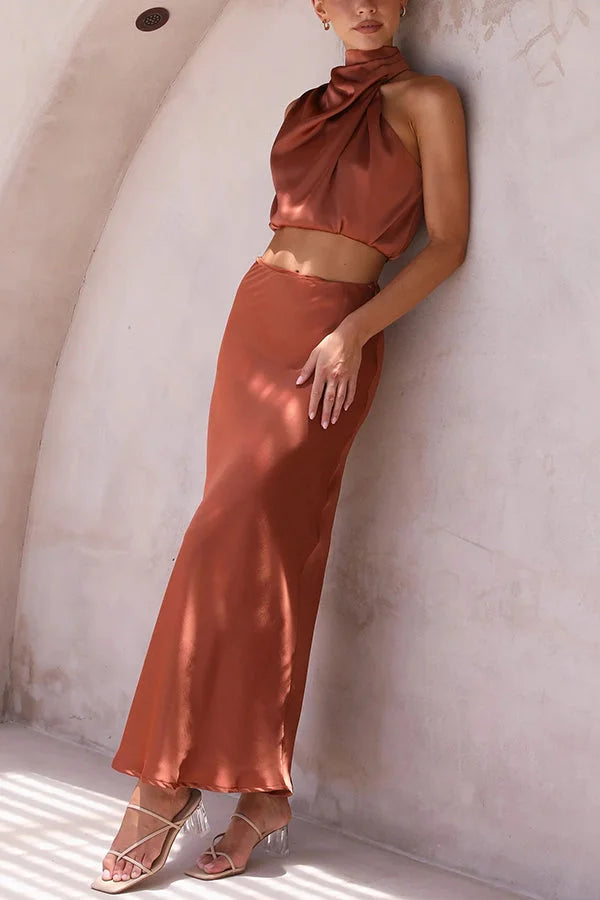 Satin skirt and top set by Ruthann, featuring a flowing design in lush satin fabric, perfect for elegant occasions.