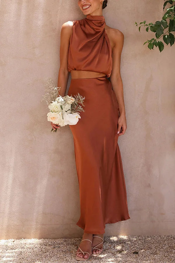 Brown satin skirt and top set by Ruthann featuring a flowing design.